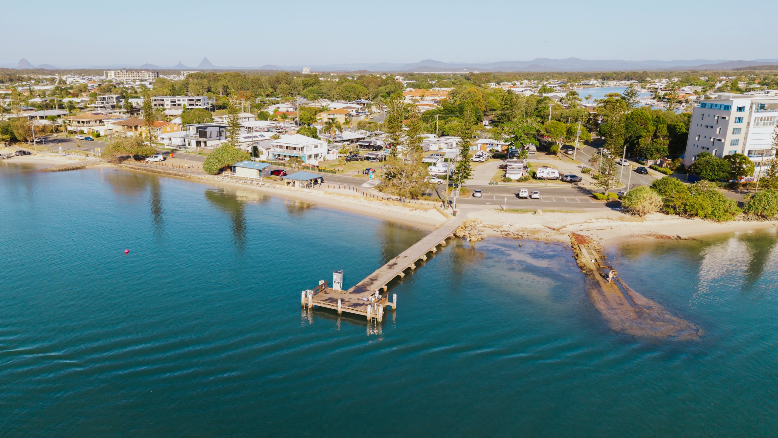 Before: current aerial image looking down on jetty and groyne