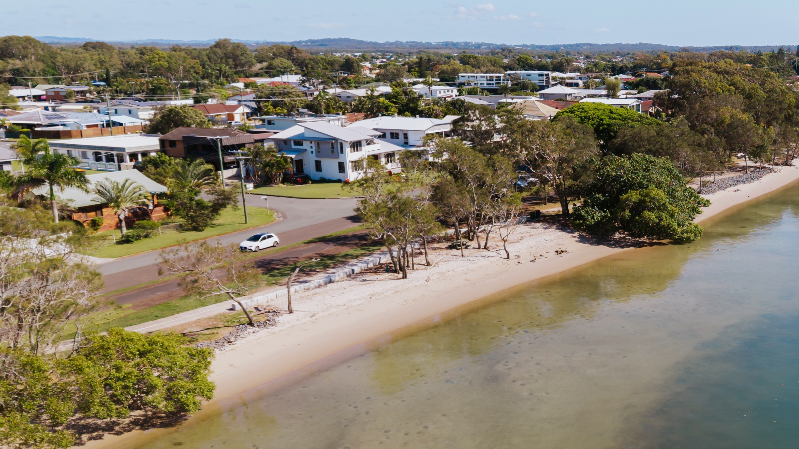 Before: current aerial image of beach near Joan street 