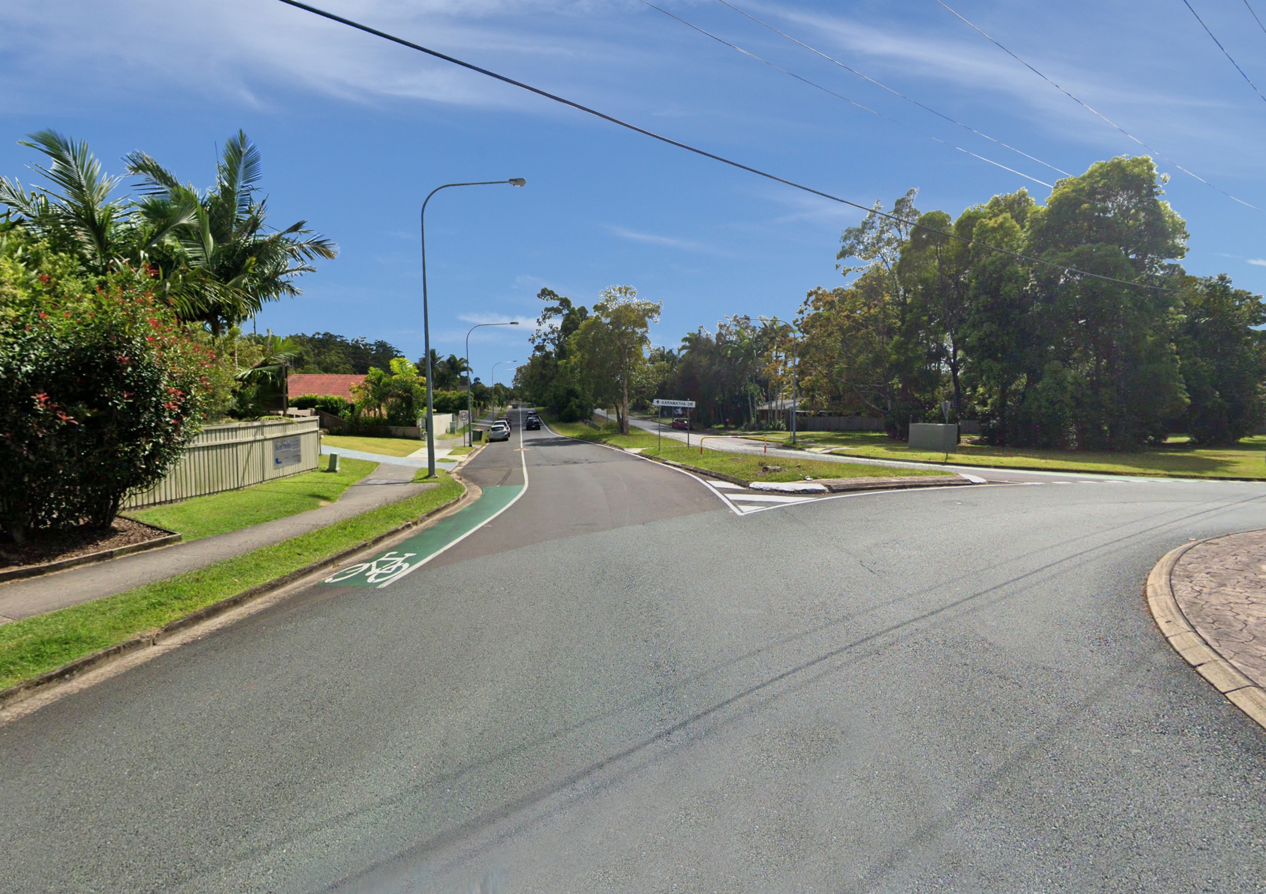 Before: Existing view north east up Karawatha Drive at roundabout at Golf Links Rd, Mountain Creek