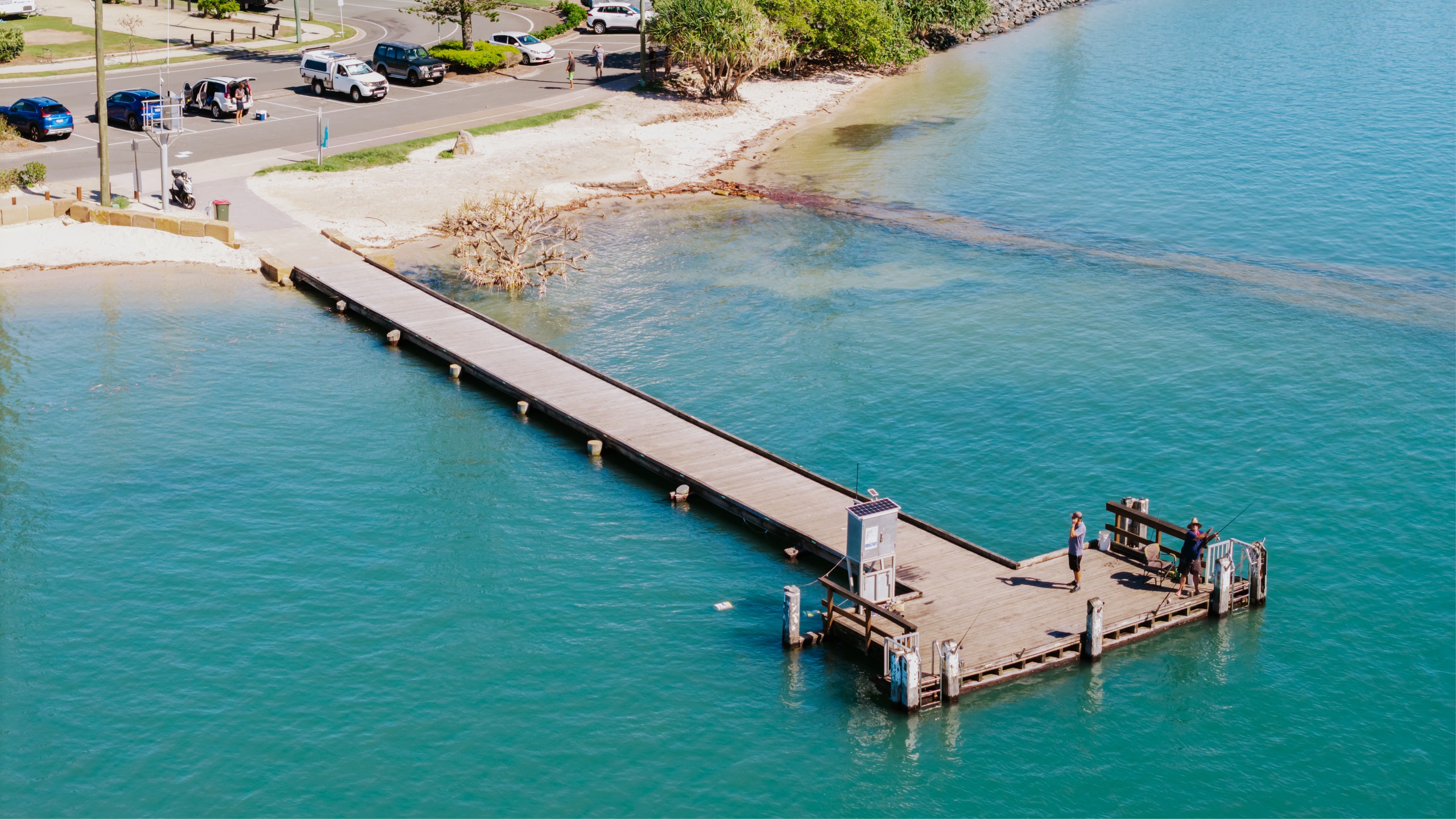 Before: close up aerial image of the miliary jetty and accessible groyne 